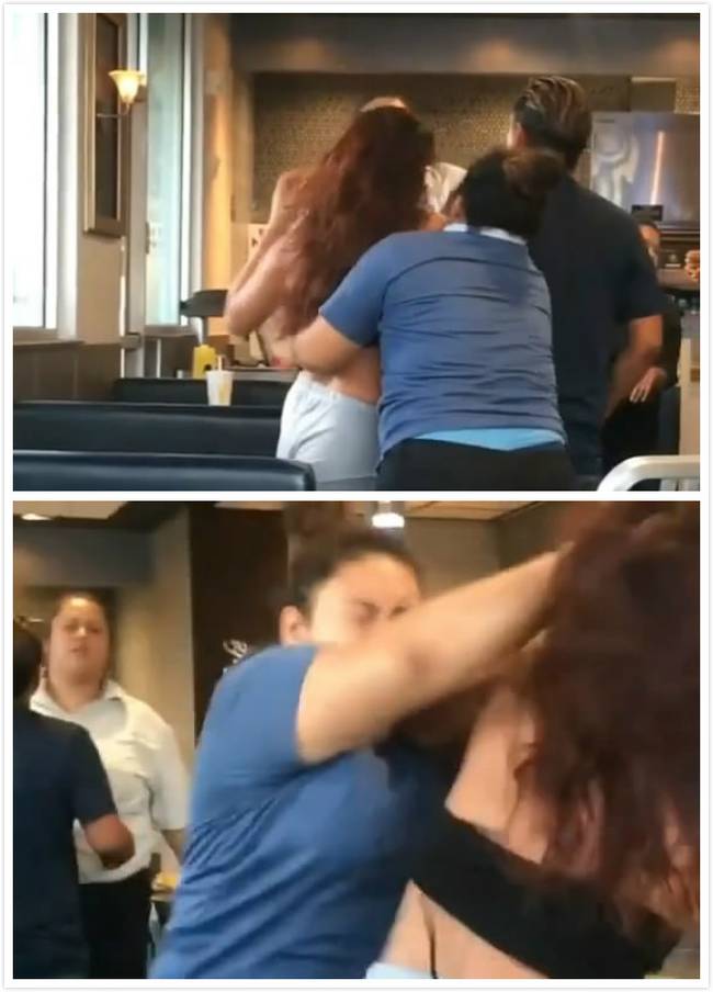 一名蓝衣服女员工试图拉开顾客，但是这两个人又打了起来