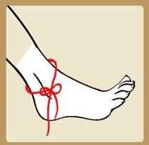 脚上系个红绳是什么成语